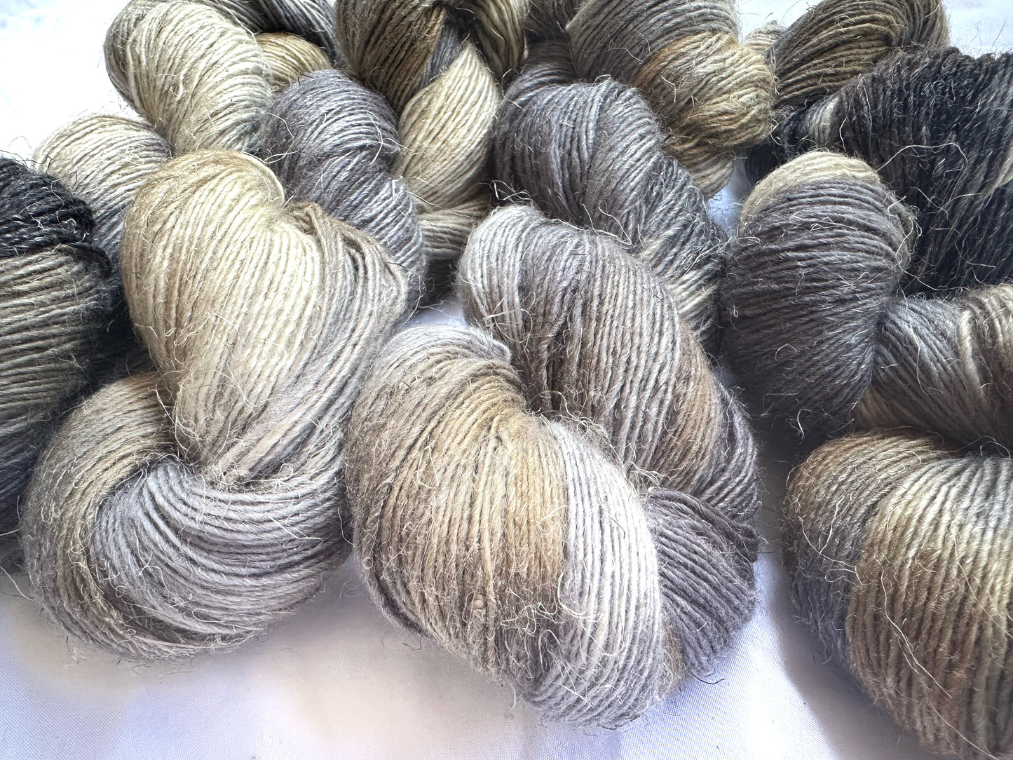 Fingering variegated neutral tan gray cream