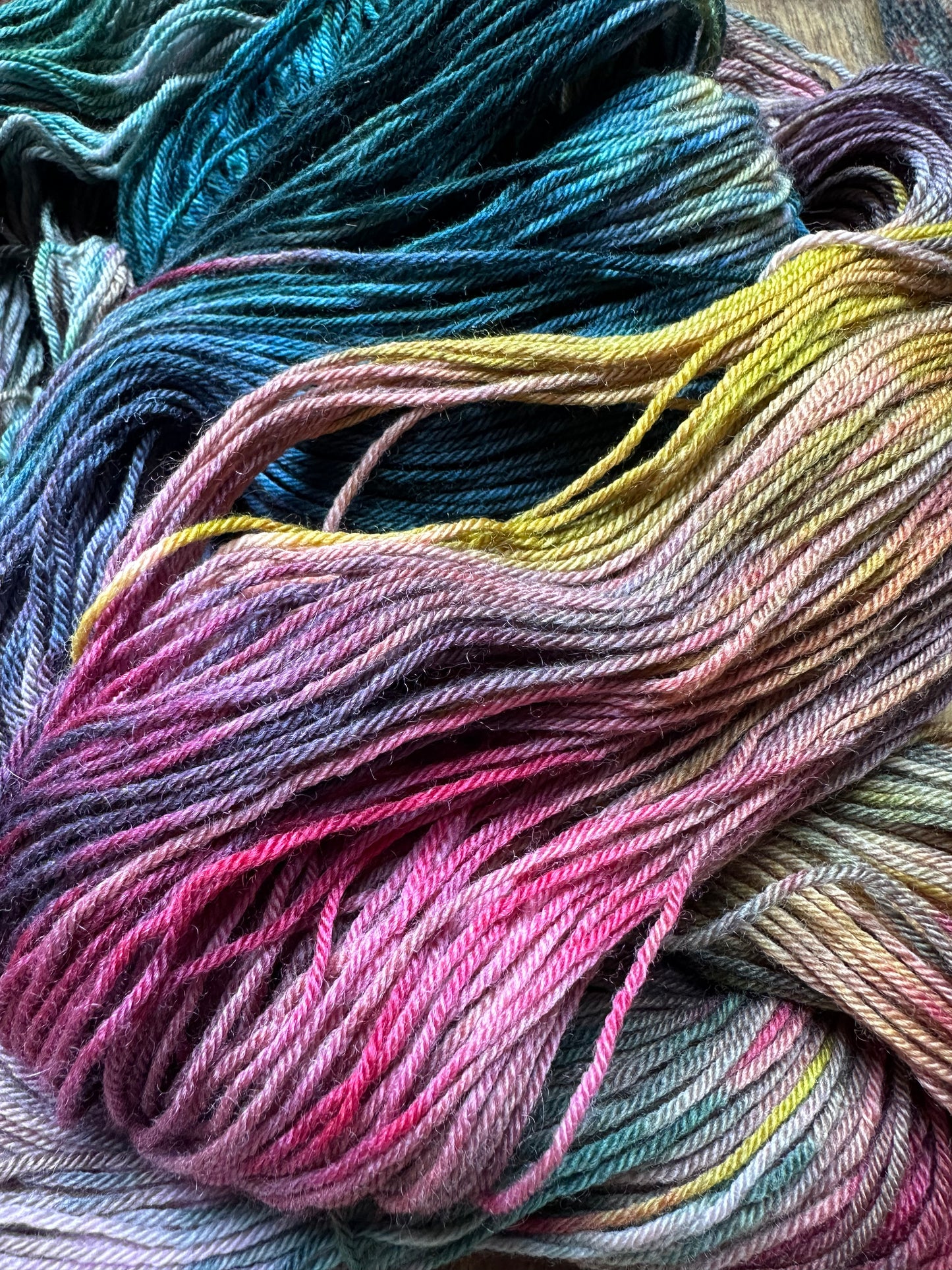 Variegated teal, pink chartreuse MCN fingering wool