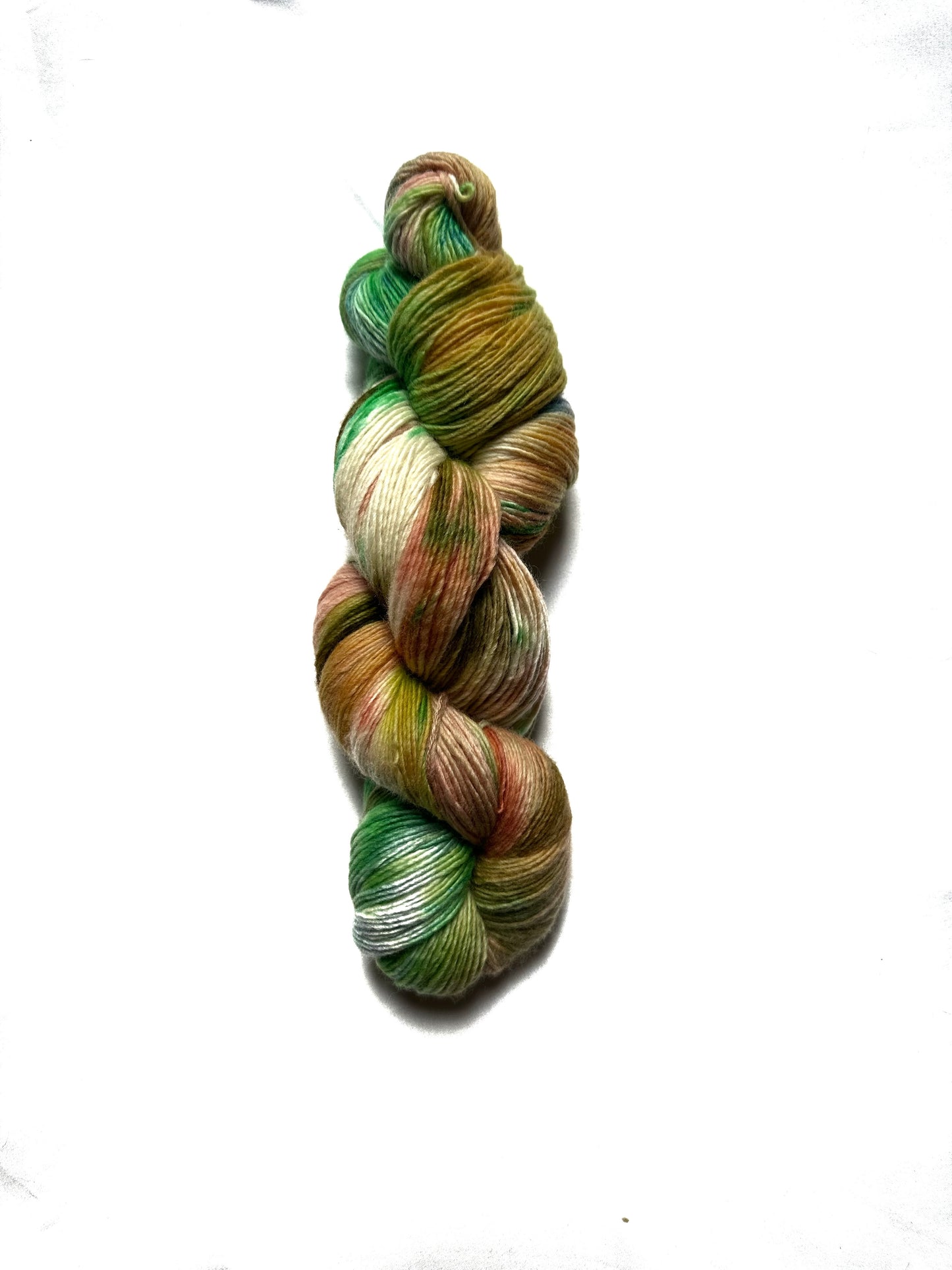 Fingering peach green variegated