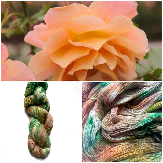 Fingering peach green variegated