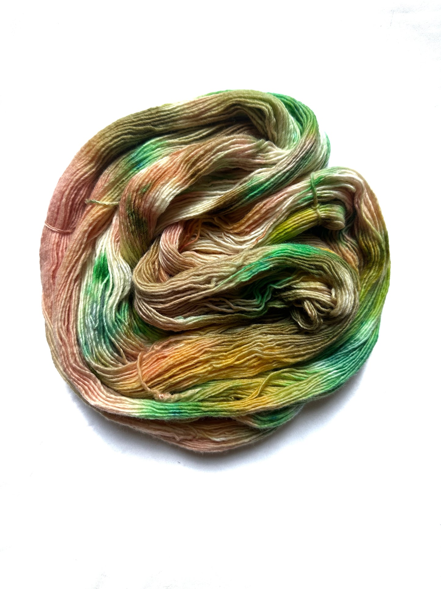 Fingering peach green variegated